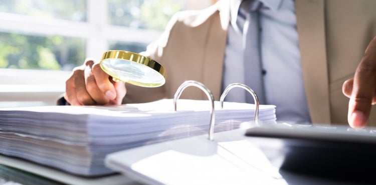 Person analyzing insurance claims Person analyzing insurance claims